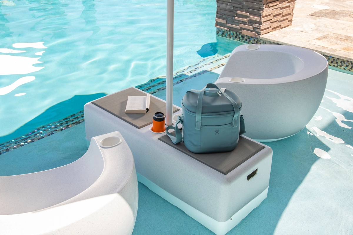 Tenjam pool chairs and seating arranged in shallow water